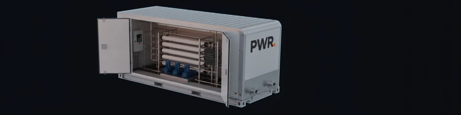 Render of a containerized PWR treatment module with one side open, showing membrane pressure vessels, pumps and a control cabinet inside